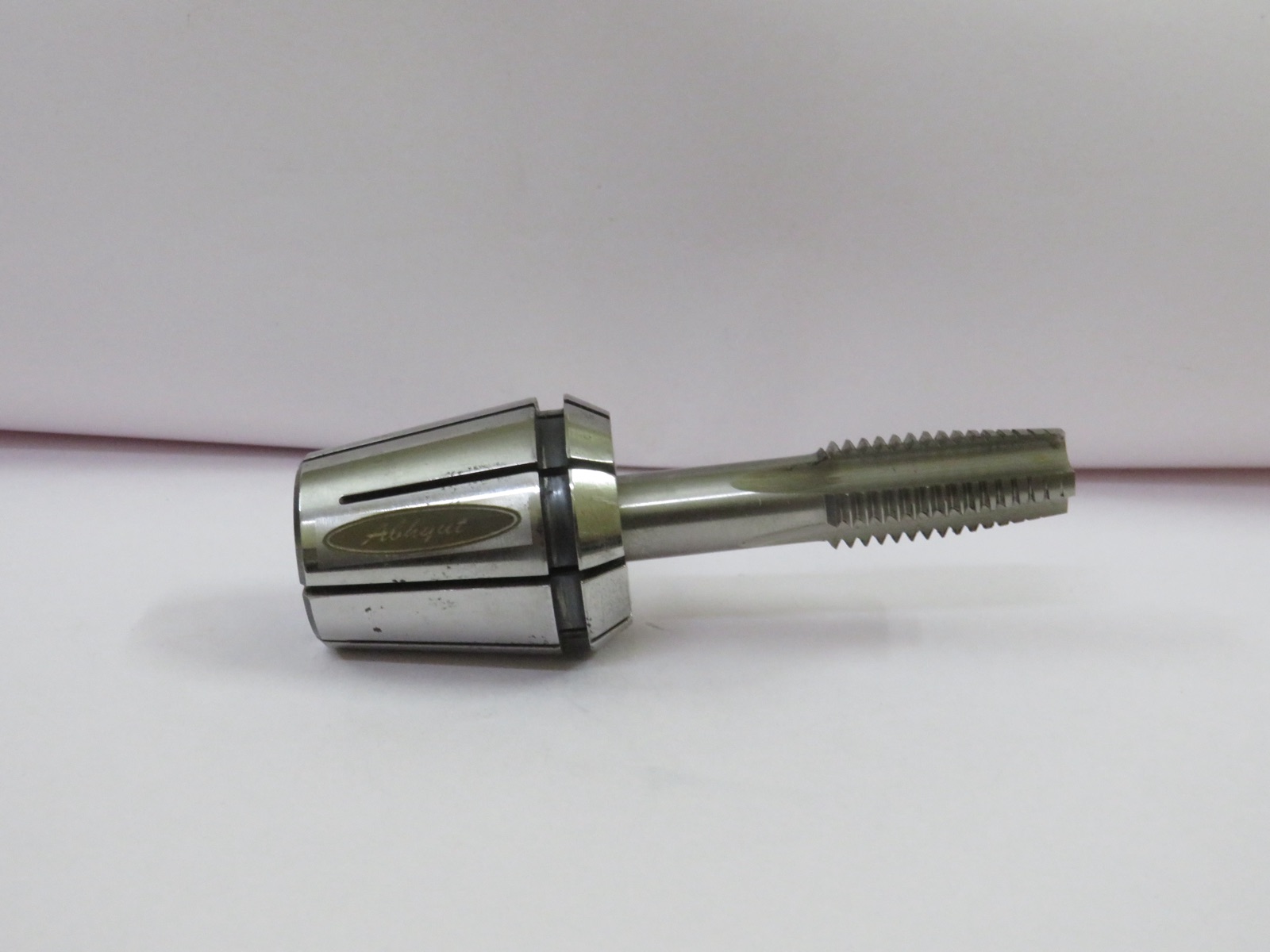 Tap collet with tap